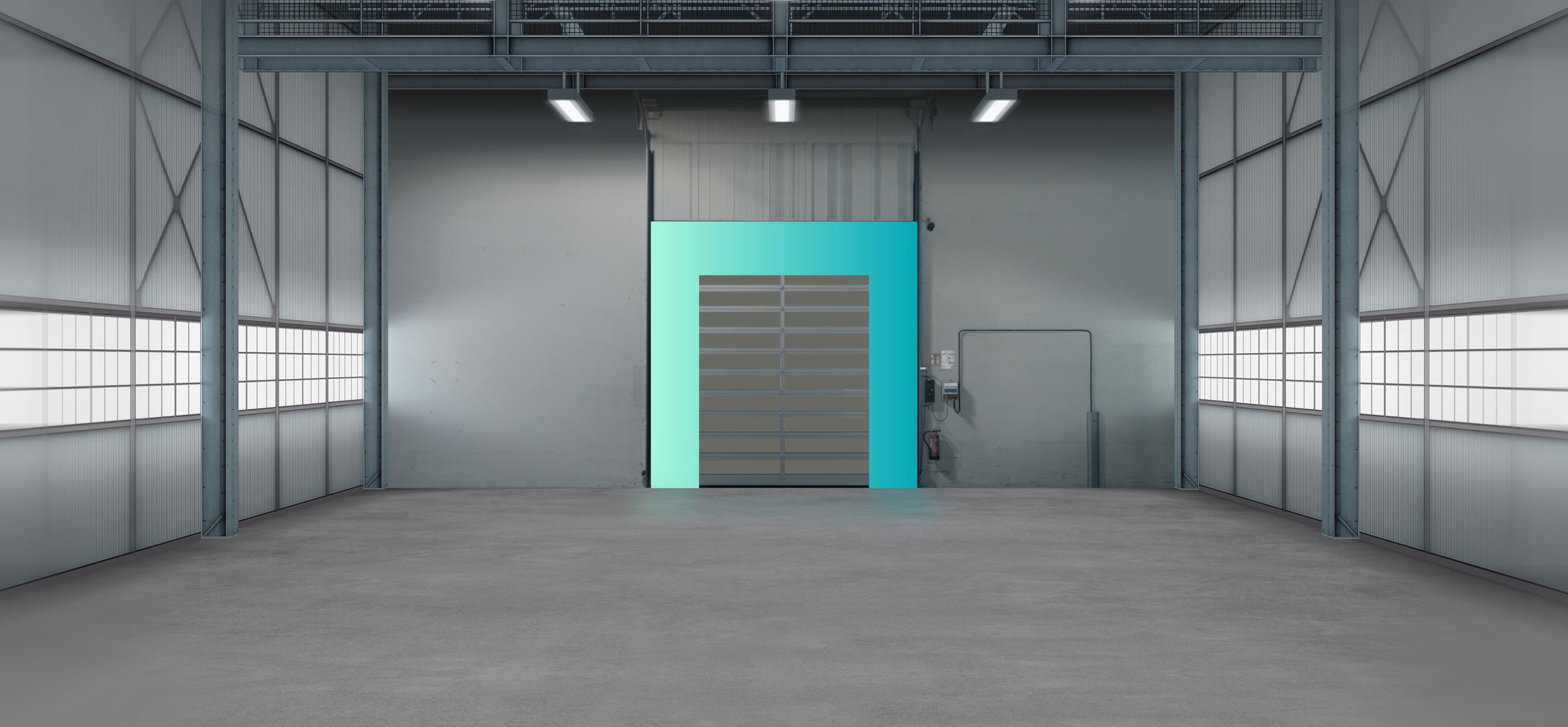 Spacious industrial warehouse interior with gray walls, large teal door, and overhead lighting.